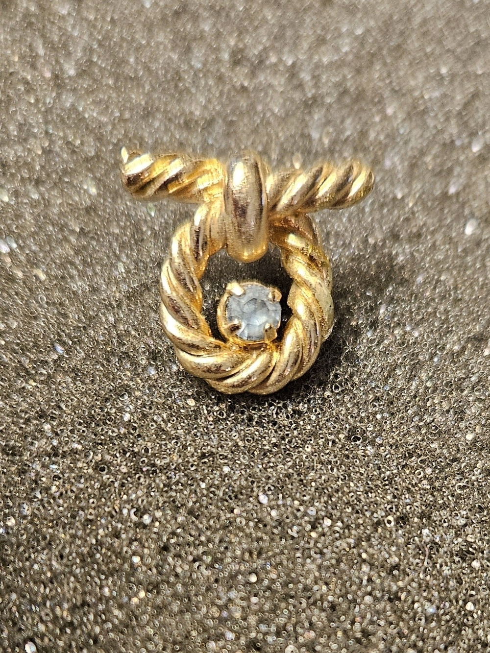 Gold-Tone Rope Circle Tie Clip with Clear Stone.